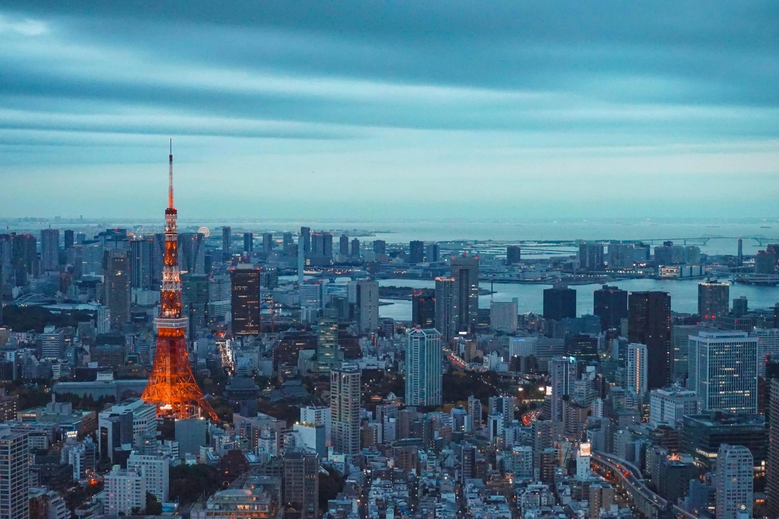 SBI Holdings, a Japanese financial giant, is pivoting its blockchain efforts to Solana for tokenization and stablecoin issuance.
