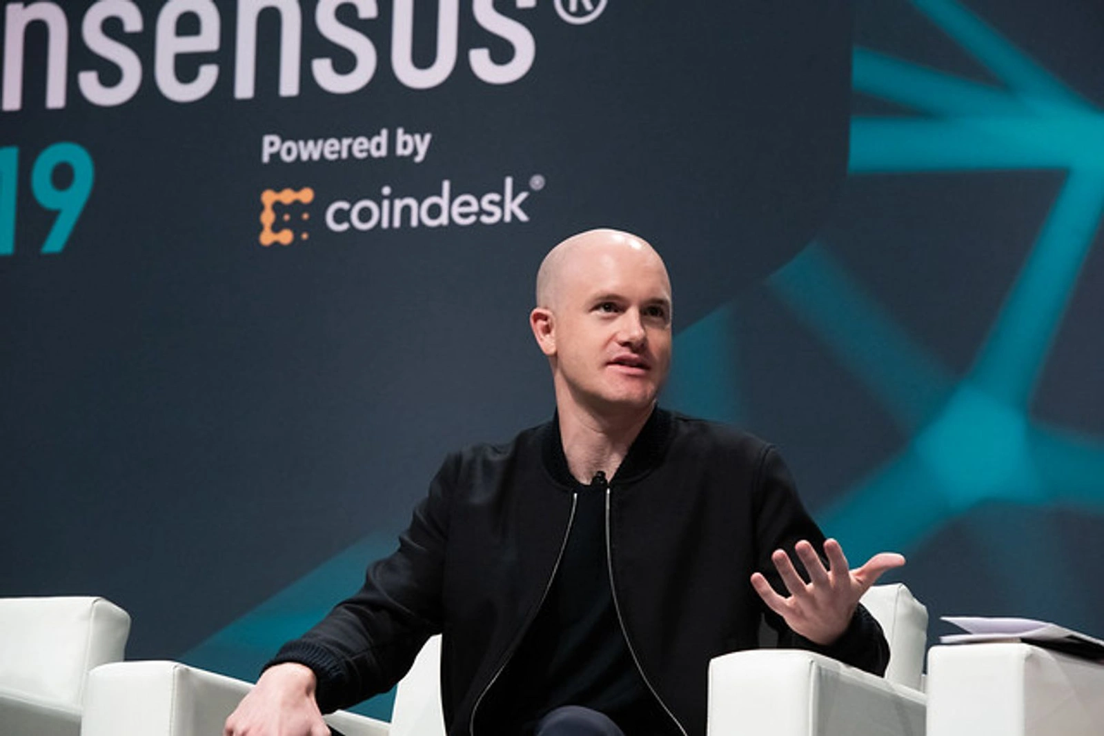 Coinbase CEO knocks crypto startups rebranding to AI.